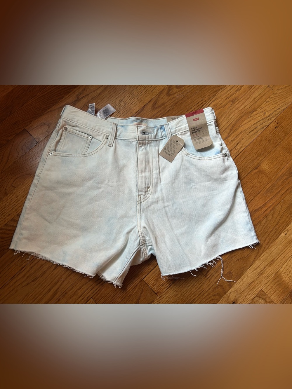 Levi's White High-Rise Cutoff cinch  Jean Shorts